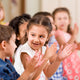 Preschoolers playing in classroom.