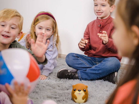 PASS THE BALL WITH OLIE™ The Interactive Hot Potato Game! - Discovery Toys