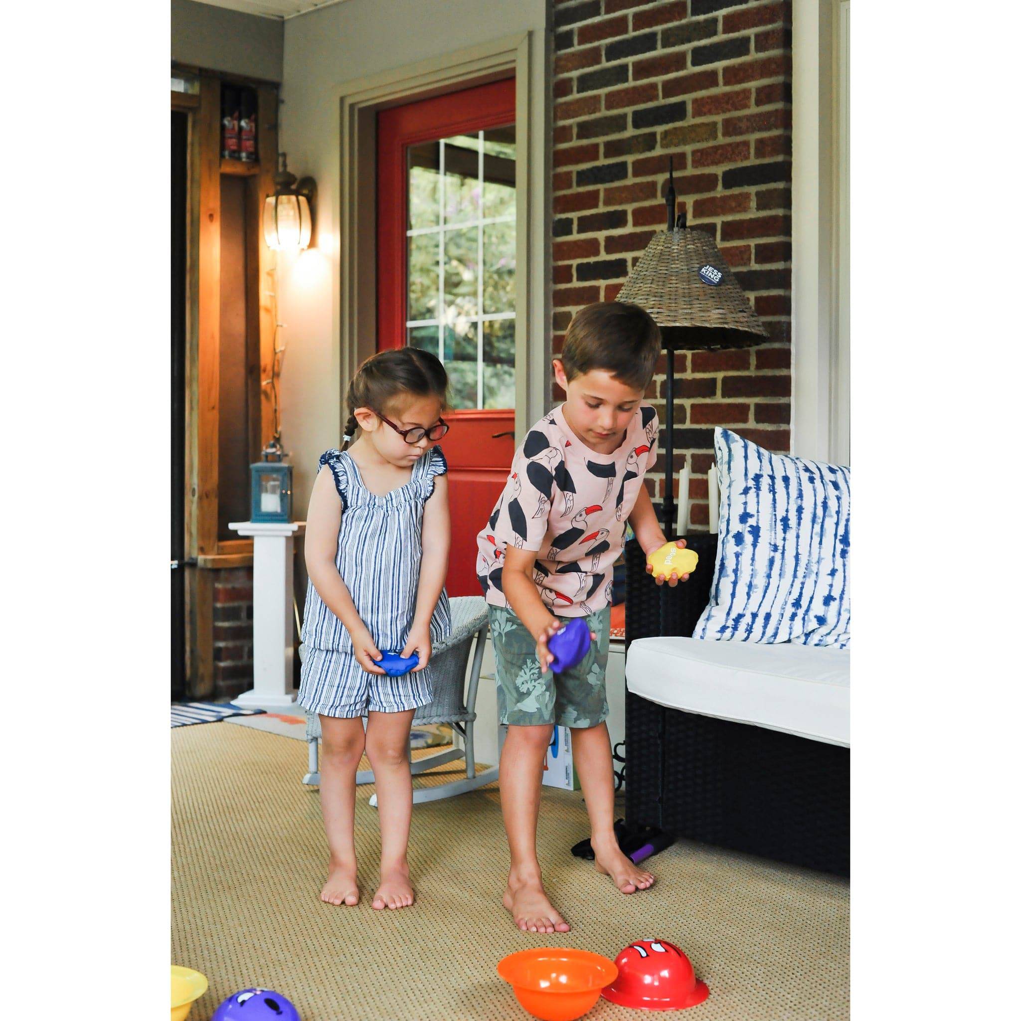FLIP FLOP FACES Bean Bag Toss & Emotions Game - Discovery Toys